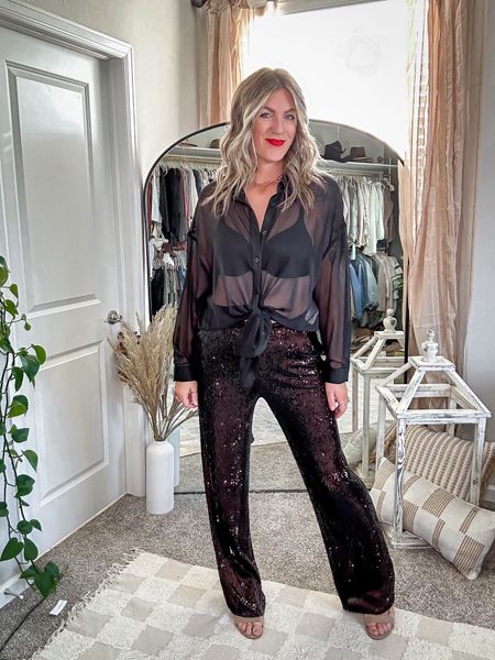 Holiday party look!

Sheer button up - XL
Sequin pants - 50% off!!!! 3 colors, available in lengths and has a matching blazer, wearing a 10 long

#LTKHoliday #LTKmidsize #LTKparties