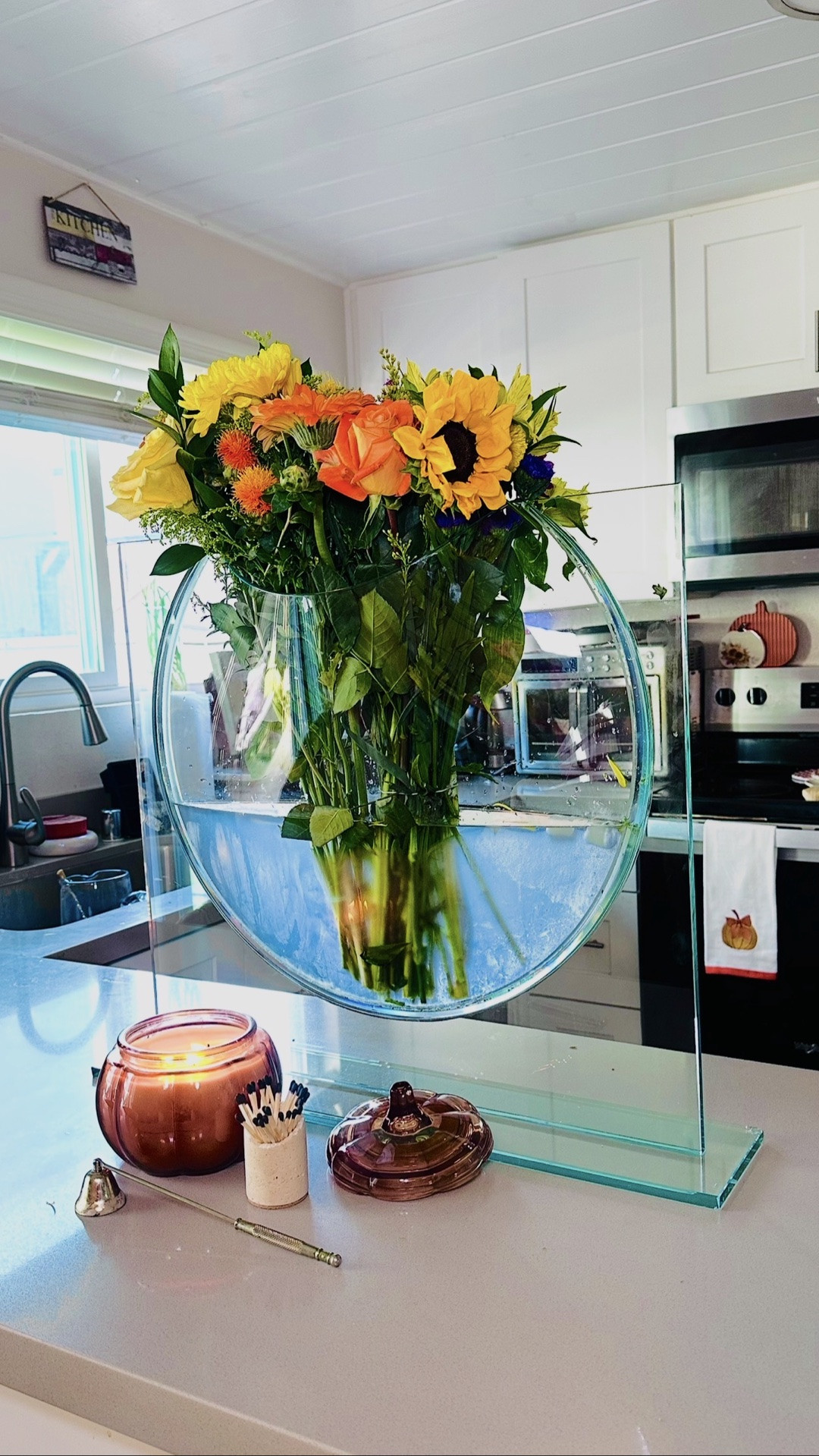 Styling my @zgallerie Ellipse Vase is so satisfying. 

From the deep scrub in the sink with all the bubbles, to rinsing it clean, drying it on the with paper towel, and then styling it on the island with fresh water, ice, cap if bleach to keep the bacteria out and flower food! 

These yellow and orange roses, plus the amber candle and matches in front. Such a gorgeous reset.

#LTKstorytime #LTKHome #LTKselfcare