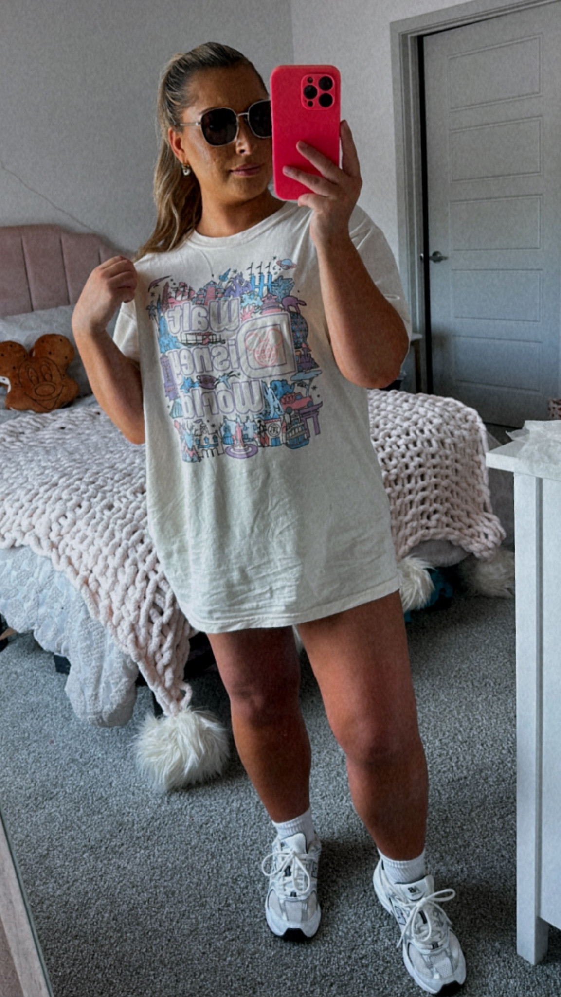 Oversized graphic tee for a comfy fit at Walt Disney world. pink/Purple/Blue Walt Disney World Mickey and friends graphic tee. Paired with biker shorts and new balance 530s 

#LTKtravel #LTKfindsunder50 #LTKActive