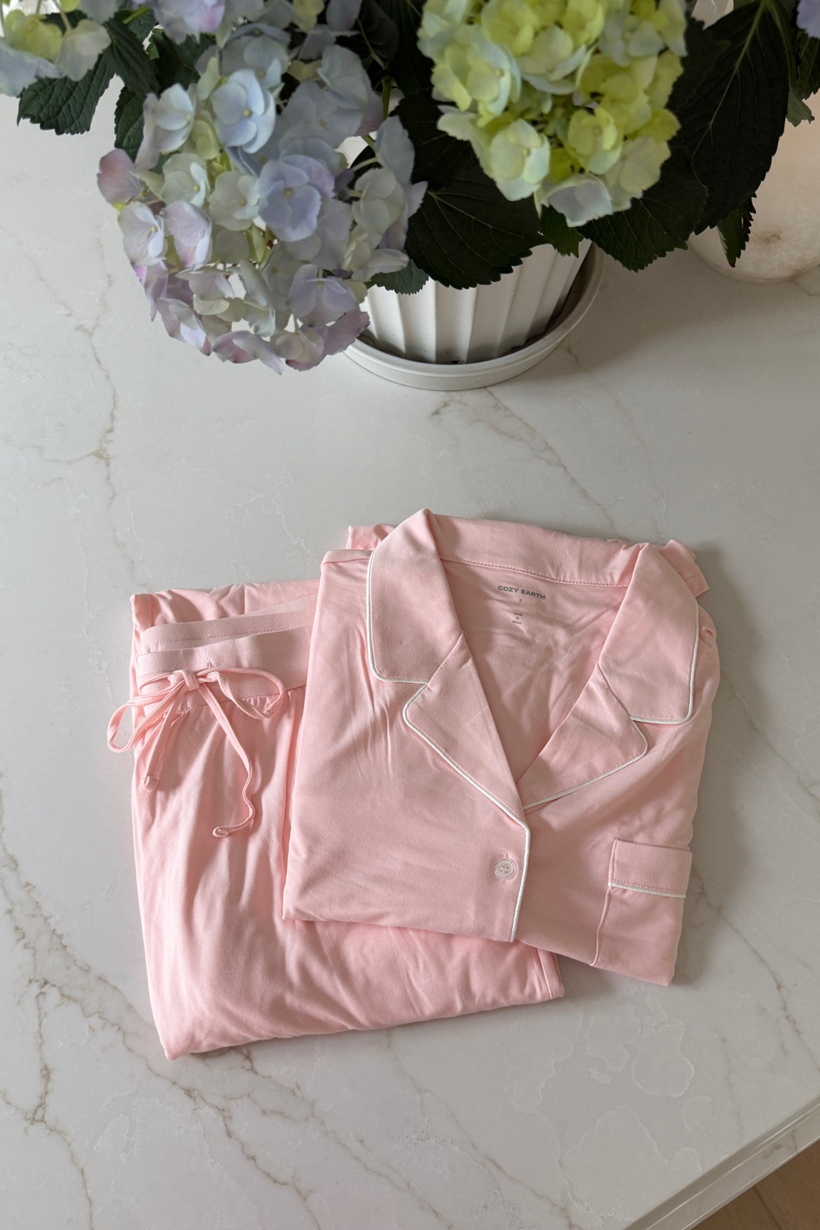#ad This pajama set from @cozyearth is just as cozy as it is cute!! Makes an amazing gift for yourself or someone special! I gave these to my Mom for Mother’s Day and she said they are the softest pajamas she’s ever had! 

#LTKselfcare #LTKSaleAlert #LTKmorningroutine