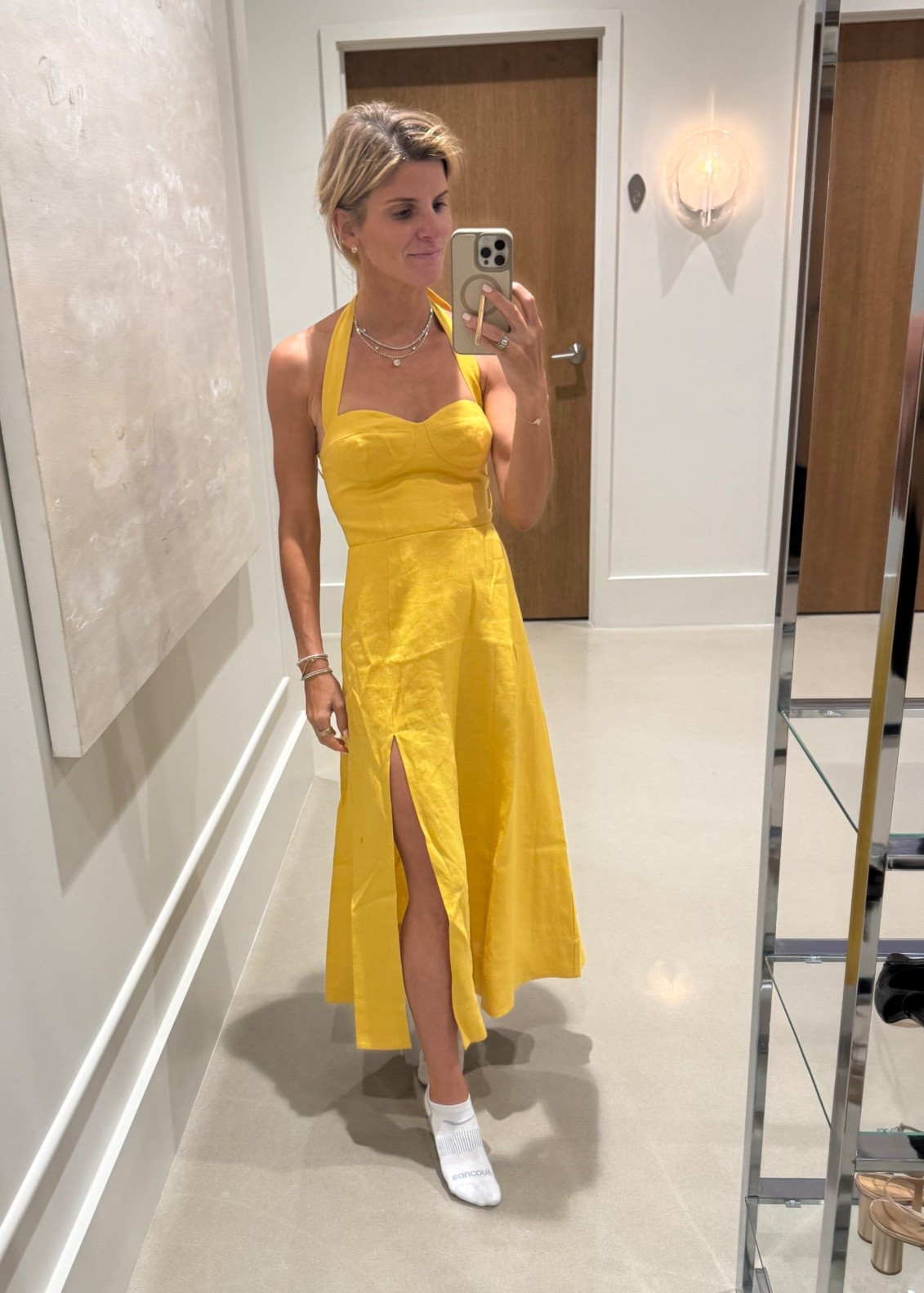Wearing size 0. Love this yellow linen dress 