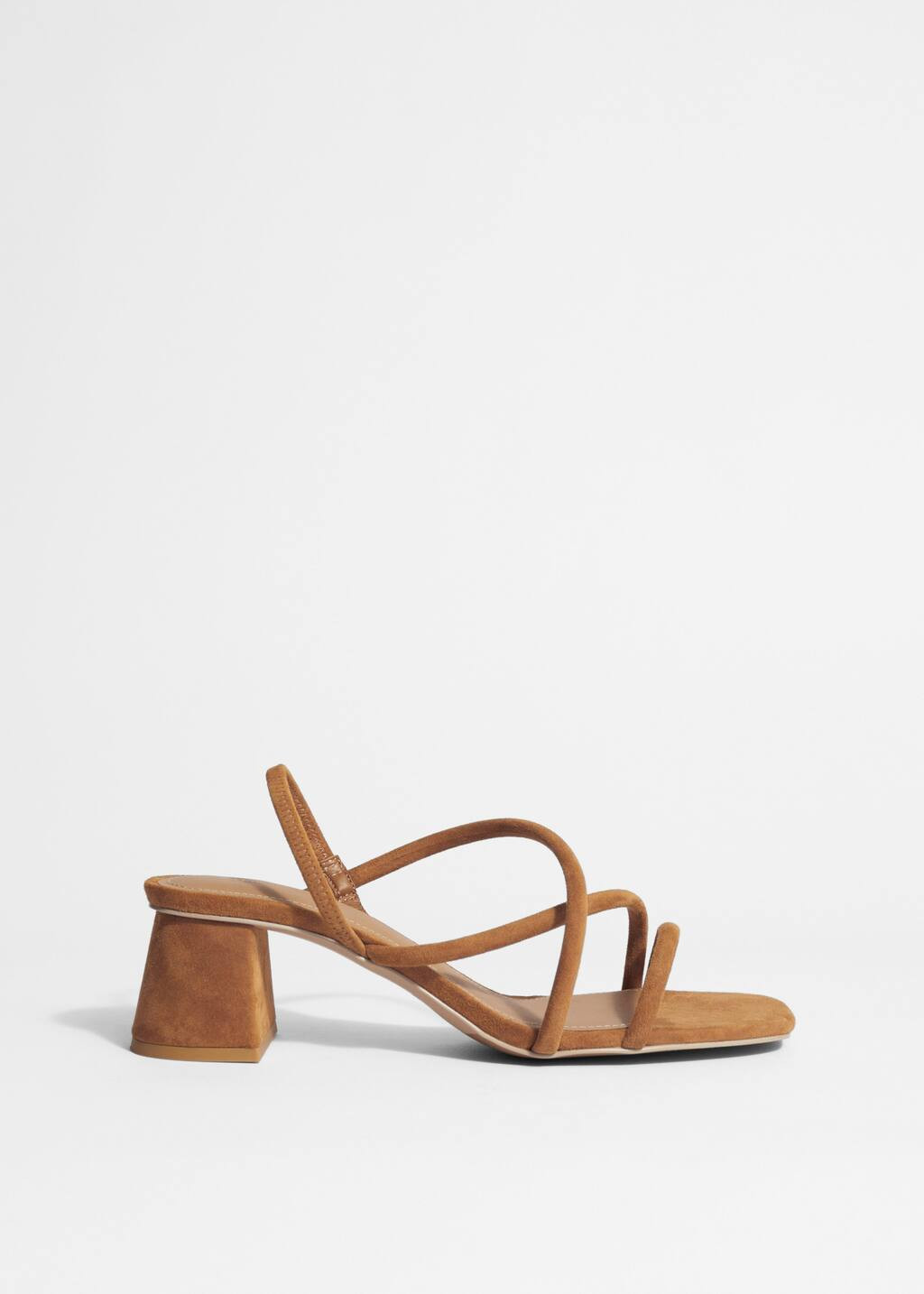 Block heel sandals crafted from soft leather. Featuring a minimalistic strappy silhouette finish... | & Other Stories EU