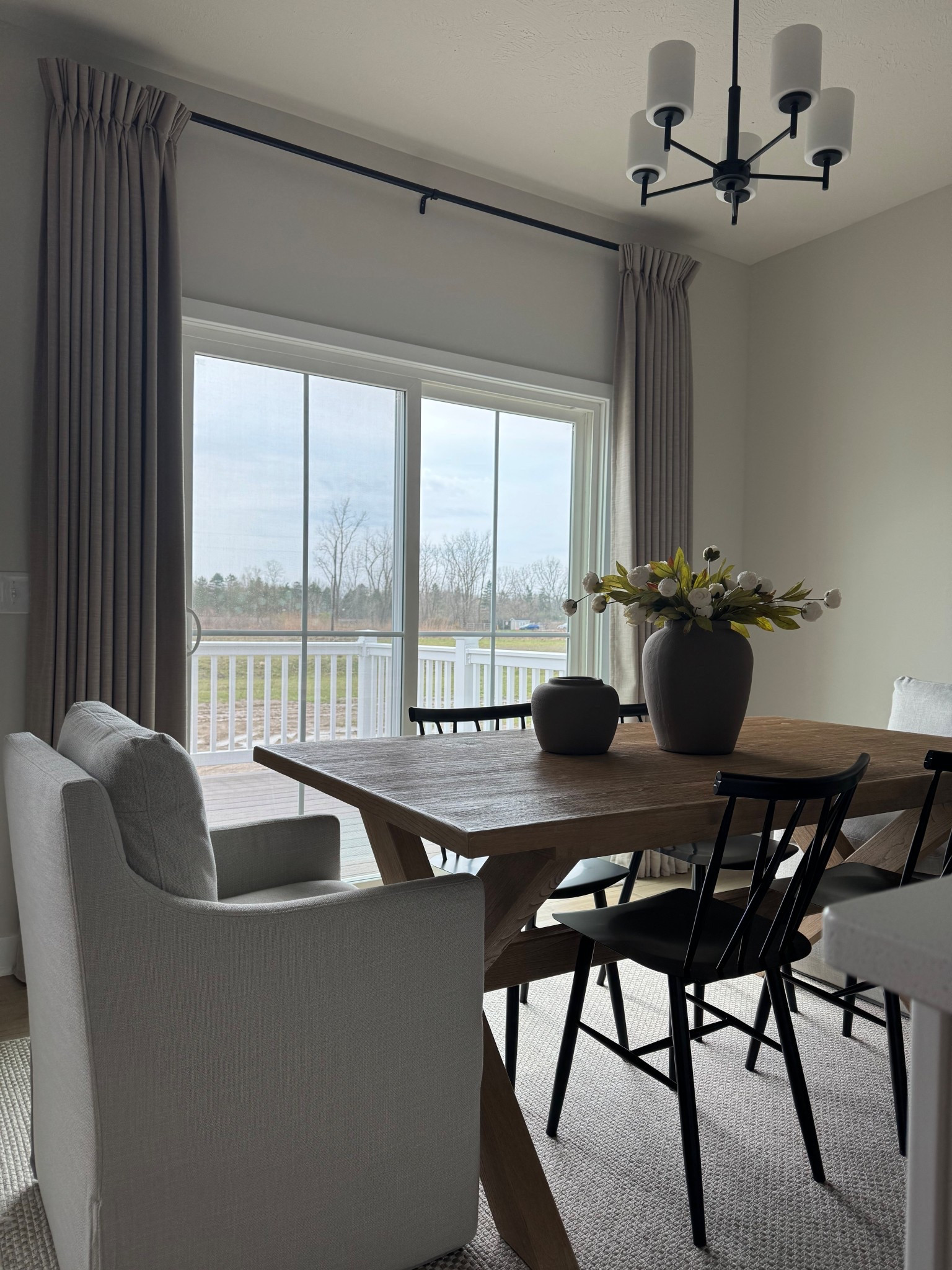 Upholstered chair, cream rug, Amber Lewis rug, Malibu rug, wayfair rug, black metal chairs, cream Peonies, Toscana dining table, pottery barn dining table, dining room 

#LTKSaleAlert #LTKHome #LTKMidsize