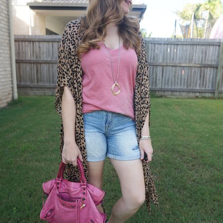 Pink and leopard 💕 Adding a bit of print to this pink tee and denim shorts outfit with three leopard print cover up, and more colour with my sorbet pink Balenciaga city bag💕

#LTKitbag #LTKaustralia
