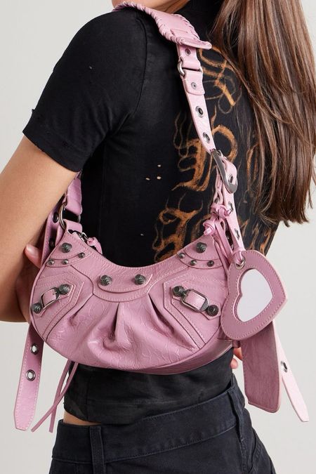 Balenciaga bag. Pink bag. 
Le Cagole leather shoulder bag. Summer, spring, colorful bag. 
Y2K. Statement piece. Designer bag. Wardrobe staple. Timeless. Gift guide idea for her. Luxury, elegant, clean aesthetic, chic look, feminine fashion, trendy look. Farfetch. 

#LTKfestival #LTKstyletip #LTKpartywear