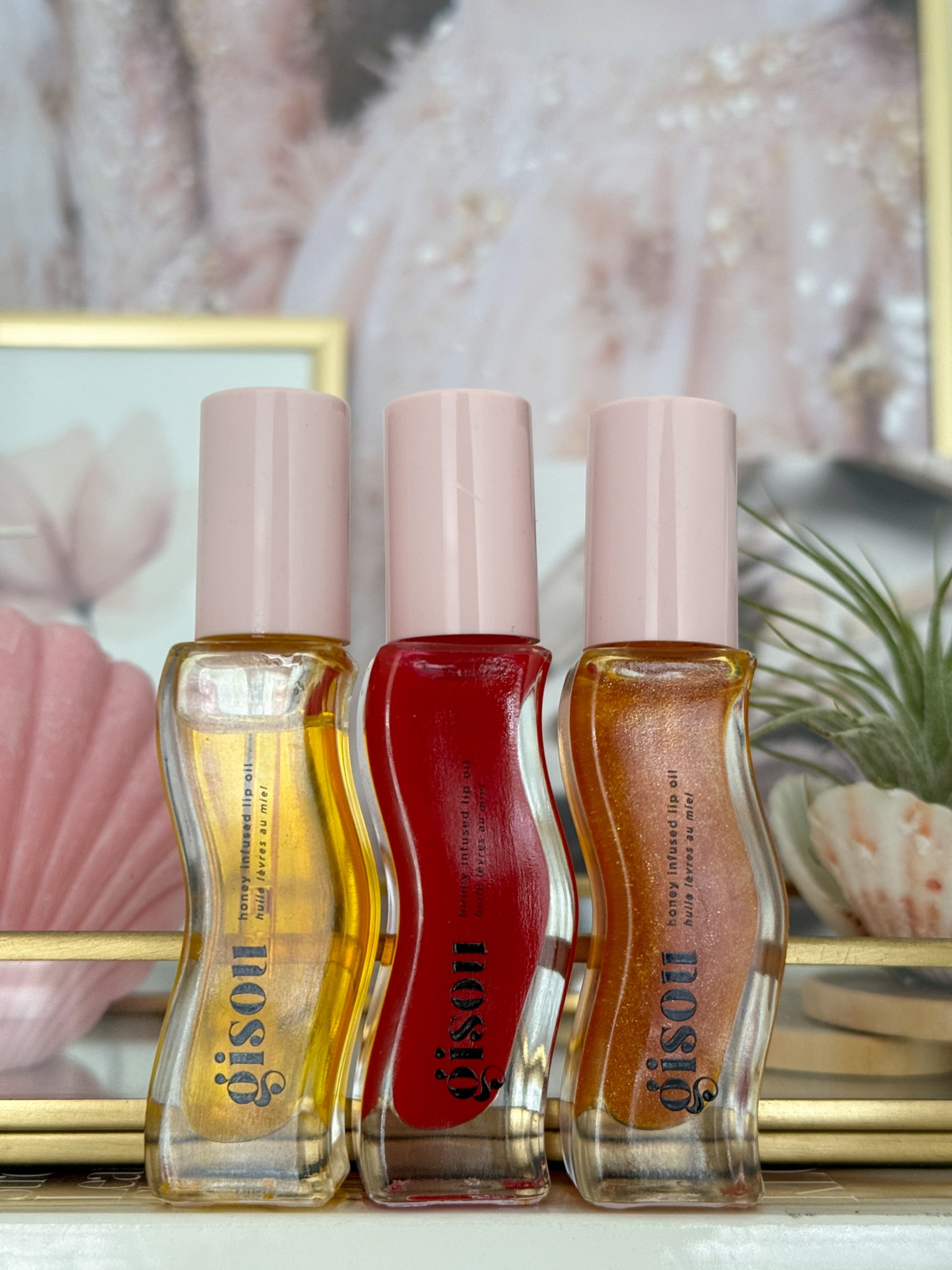 Gisou came out with 3 new lip oils and I couldn’t resist getting one! I already have the original and the original with shimmer and now I added the strawberry sorbet in my collection. I was debating to get the watermelon sugar shade as well but I stopped myself! 
I really like the original and the one with the shimmer but I don’t like the smell. The strawberry sorbet though smells really nice and I love the red pink shade that it gives on the lips. From the 3 is hands down my favourite! I’m thinking to get the watermelon sugar shade closer to summer as well!

#LTKeurope #LTKbeauty #LTKxSephora