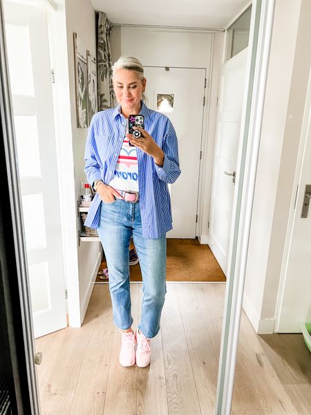 Outfits of the week

Isabel Marant t-shirt under a blue striped buttondown shirt paired with straight, blue, long tall sally jeans and pink Skechers sneakers. 

#LTKcurves #LTKeurope #LTKstyletip