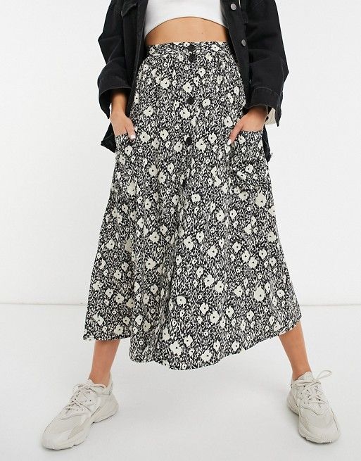 ASOS DESIGN button through midi skirt with deep pocket detail in blurred floral print | ASOS (Global)