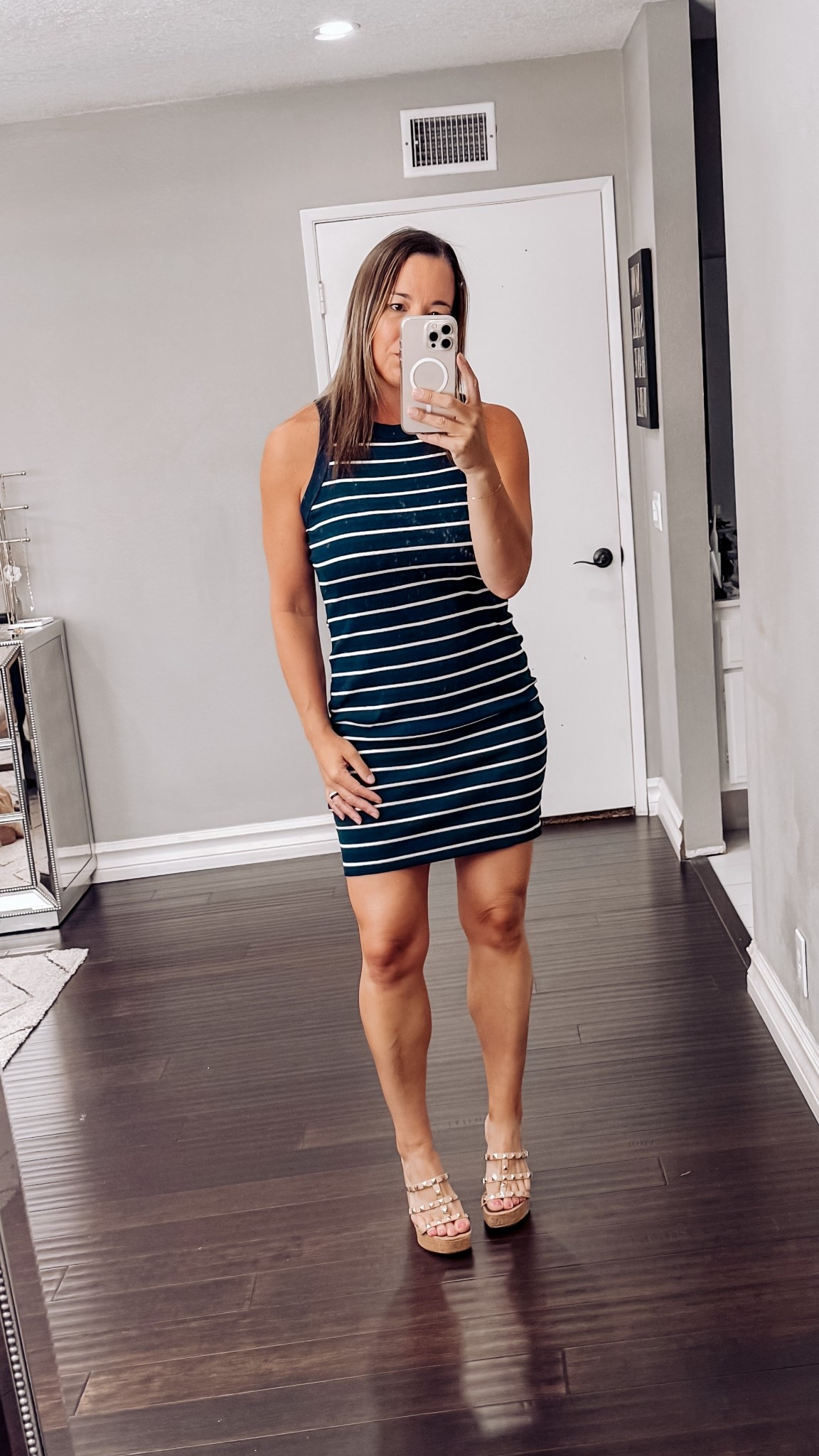 Feeling confident in this striped halter neck dress from Acelitt! Perfect for a casual day out or a summer date night. Comes in so many colors. #SummerStyle #AmazonFinds #Confidence #AffordableFashion #MomStyle #CasualChic #OOTDInspo #SpringStyle #DateNight #BrunchOutfit  

 #LTKootd #LTKSeasonal #LTKOver40