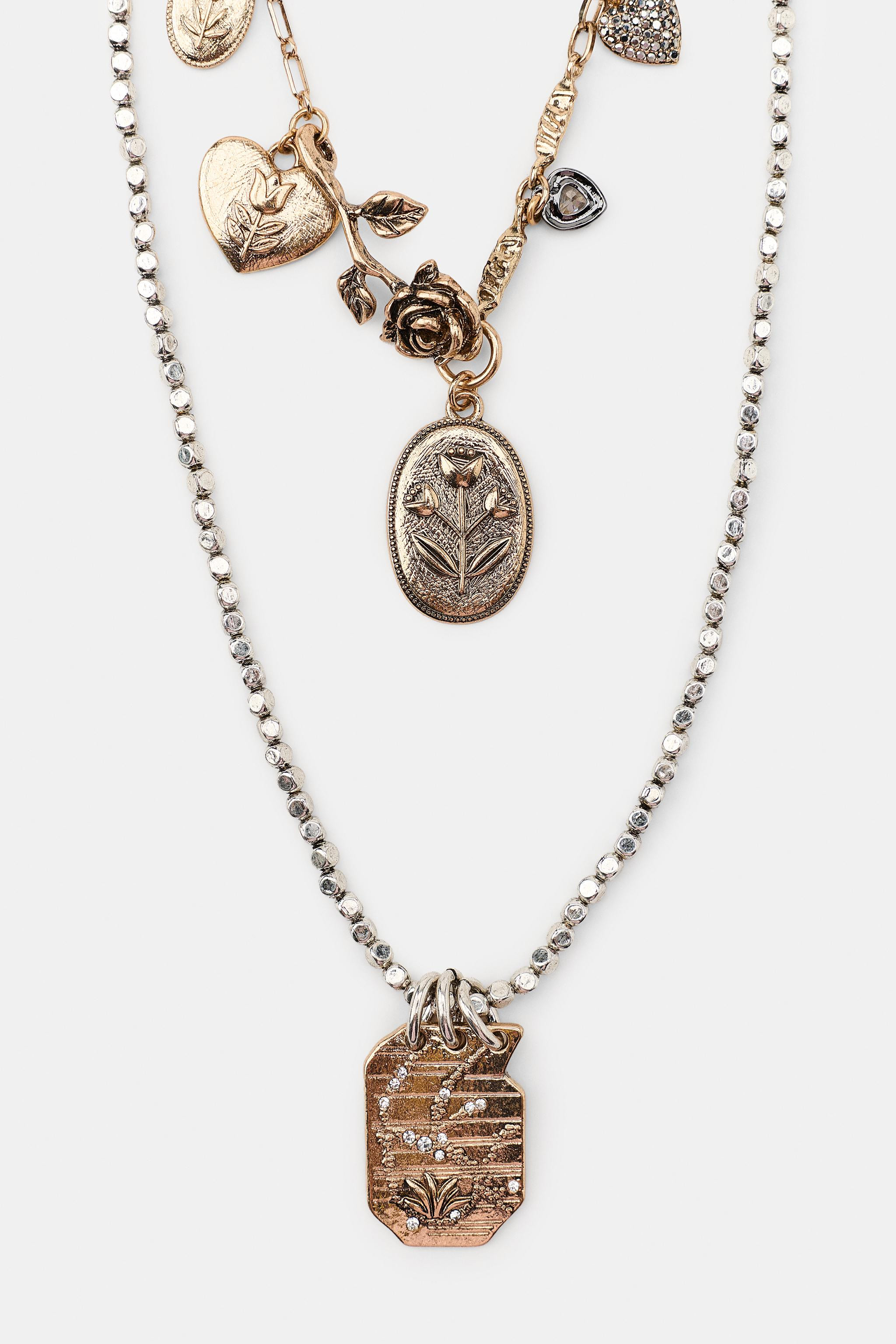 Pack of two necklaces in different lengths:- Necklace with multiple metal links featuring various... | Zara US