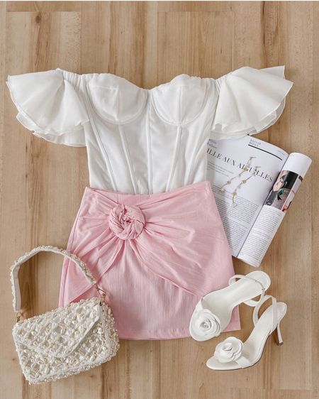 Shop the cutest outfits for the summer! 

Items (as shown):

1) Fascinating Sweetie Ivory Ruffled Off-the-Shoulder Bodysuit (under $60.).

2) Exceptional Perfection Blush Pink Rosette Mini skort (under $30).

3) Total Elegance Ivory Pearl Shoulder Bag (under $50).

4) Valko White Flower Slingback High Heel Sandals (under $80).

Keywords: Two piece outfit, mini skirt, white bodysuit, spring outfit, summer outfit, travel outfit, day date, date night 

#LTKFindsUnder100 #LTKTravel #LTKSaleAlert