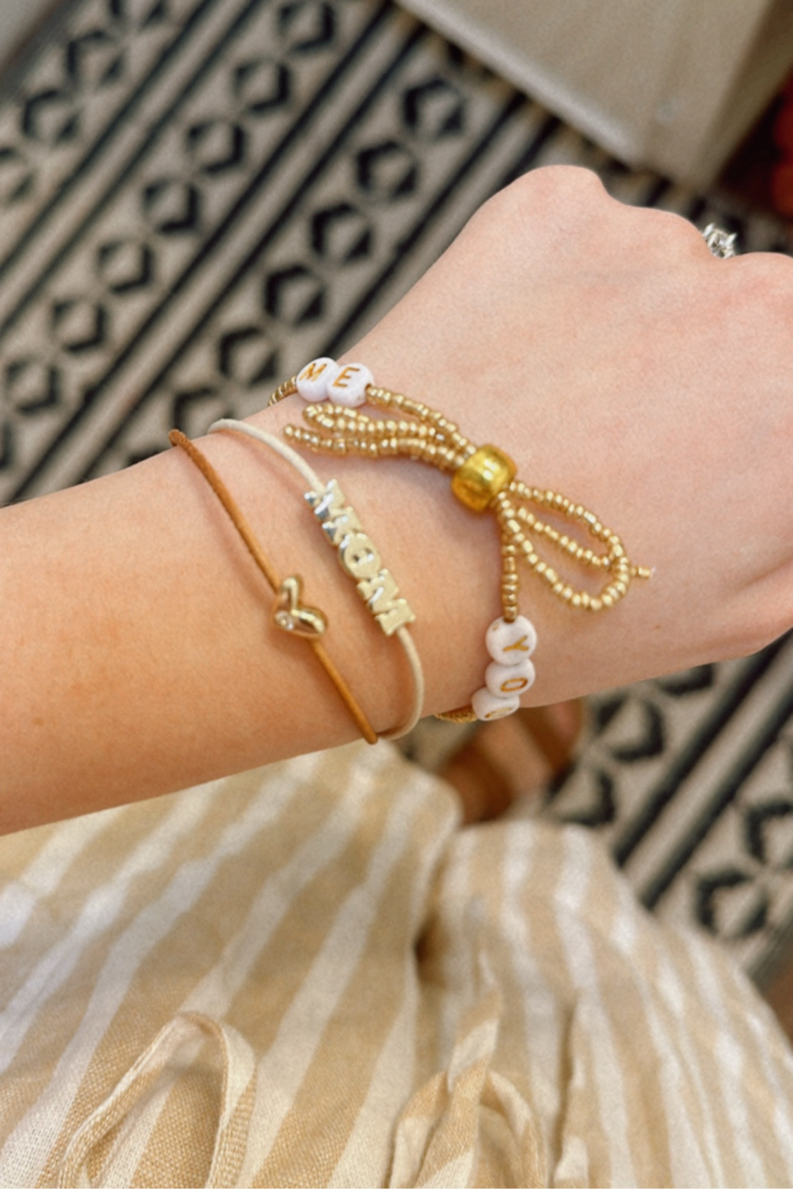 Taylor Swift friendship bracelet + Kendra Scott mom bracelet 🤍

#LTKStyleTip #LTKFindsUnder50