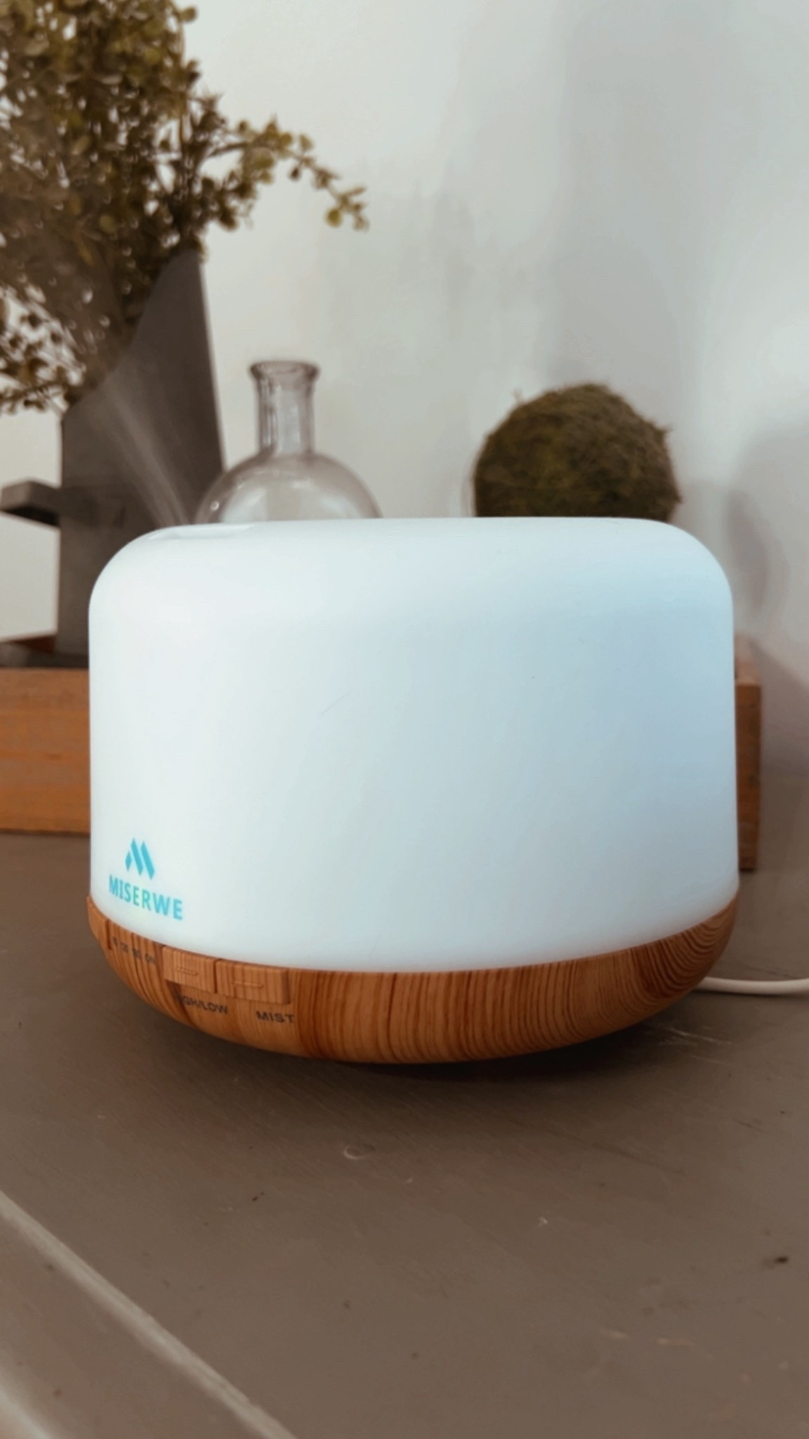 Diffuser that comes with a remote, and changes colors. You can pick small or large misting capabilities and different numbers of hours. 

#LTKOver40 #LTKdayinmylife #LTKHome