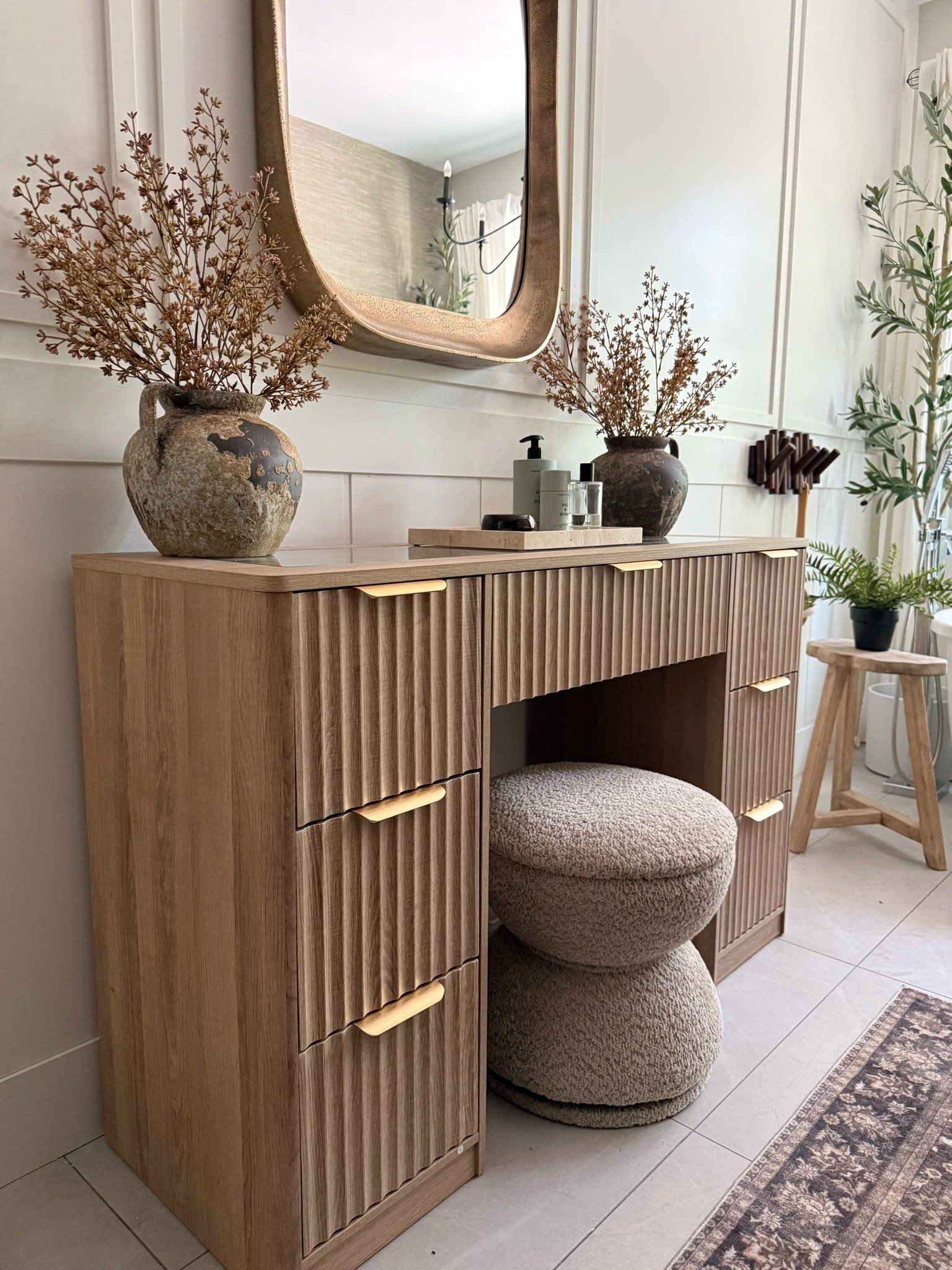 Swivel ottoman..perfect for the bathroom vanity✨