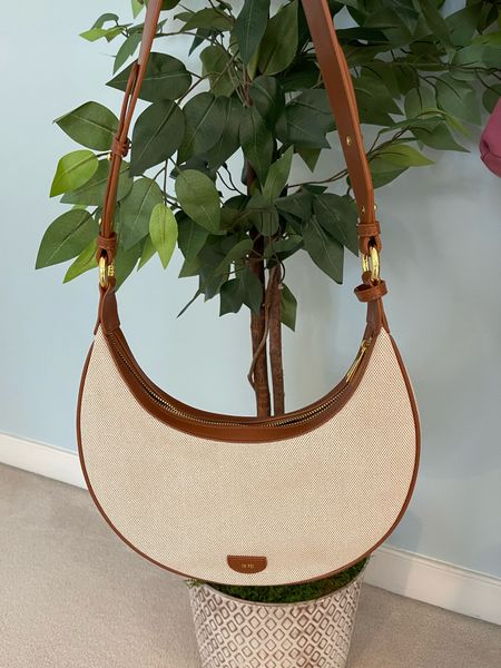 I am so impressed with the quality of this bag for the under $100 price point. Cavas with vegan leather trim. Comes packaged in a beautiful box and a dust bag. 

Timeless elegance, Classic style, Everyday chic, Versatile accessories, Must-have handbags, Stylish totes, Elegant clutches, Trend-setting belt bags, Sophisticated purse designs, Quality craftsmanship, Functional yet fashionable, Statement pieces, Fashion essentials, Timeless accessories, Chic and practical, Designer-inspired bags, Luxury handbag collection, Timeless wardrobe staples, Fashion-forward accessories, Effortlessly stylish purses, belt bag, tote bag, crossbody, shoulder bag, clutch

#LTKOver40 #LTKItBag #LTKFindsUnder100