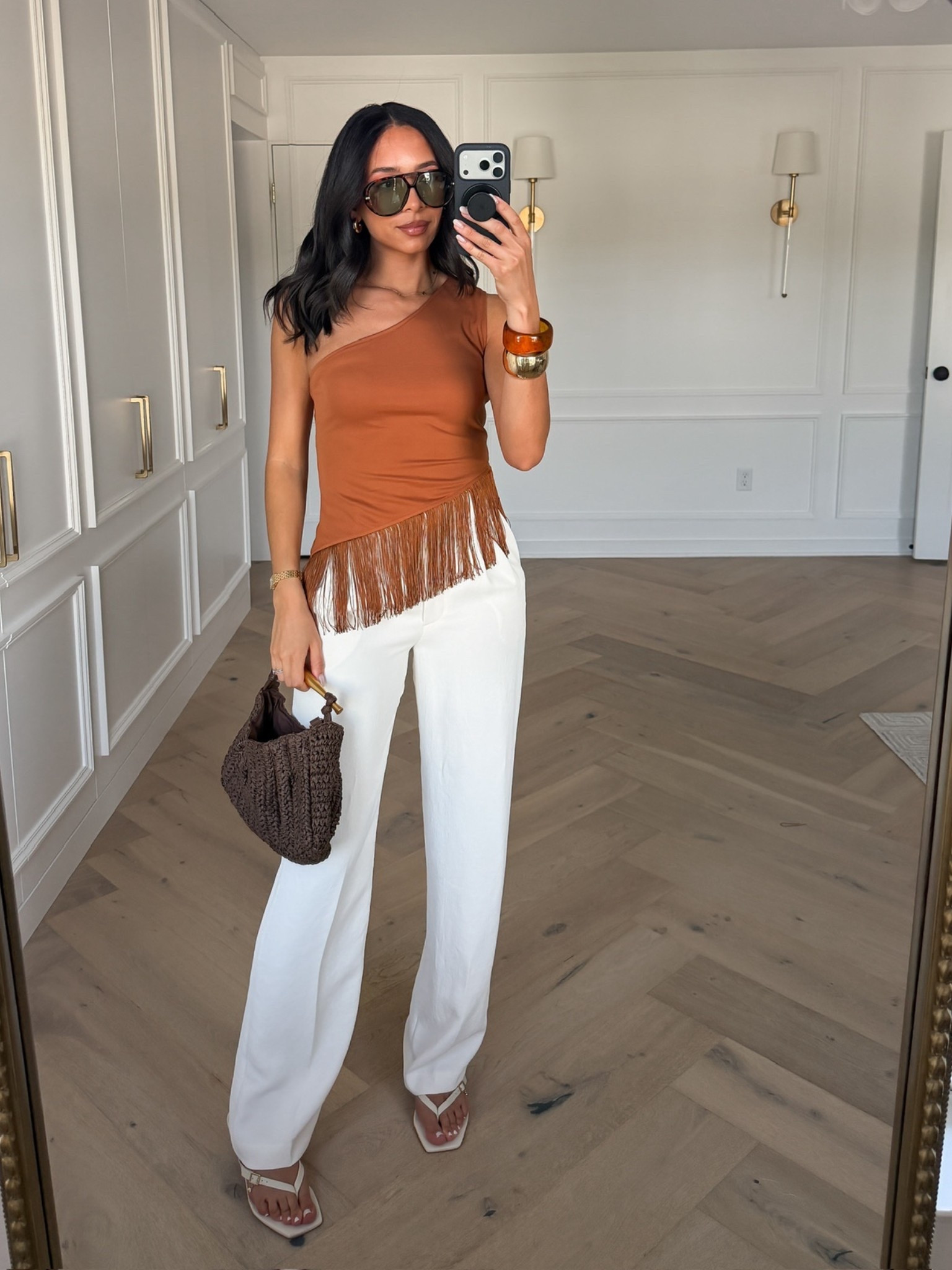 Vacation outfit ☀️🌴 Wearing size S rust fringe tank (OOS but I’ve linked similars) and size 6 tall cream trousers 

beach outfit, pool outfit, vacation outfit, Miami outfit, Miami Beach outfit, mom outfit, postpartum outfit 

#LTKmomlife #LTKSeasonal
