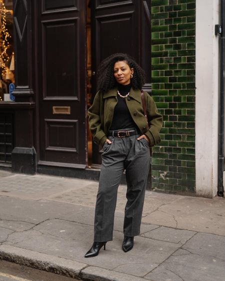 Winter outfit consisting of grey trousers, black poloneck jumper, green jacket and black pointed boots. 

Petite style, petite outfit 

#LTKSeasonal #LTKover40 #LTKeurope