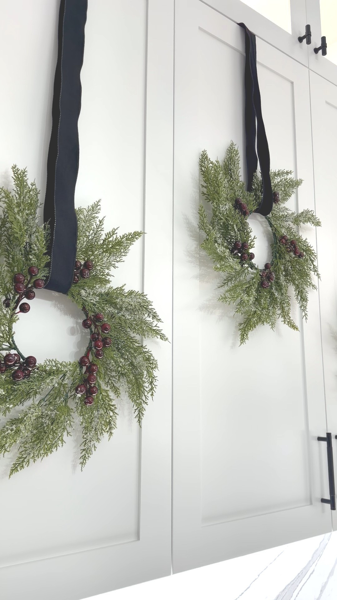 Christmas wreaths on cabinets! 

#christmas #wreaths

#LTKHoliday #LTKHome #LTKSeasonal