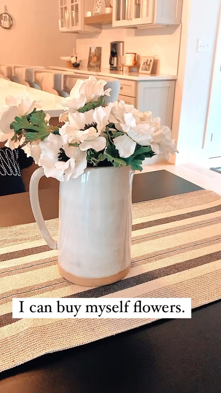 Anemones 🤍🖤 faux flowers in a beautiful vase.

I earn commissions.

Anemone flower, faux flowers, home decor, kitchen decor, living room decor, mantle decor, table decor, pitcher vase, greenery, faux plant, trendy home, neutral decor, white flowers, flowers

#LTKhome #LTKFind #LTKGiftGuide