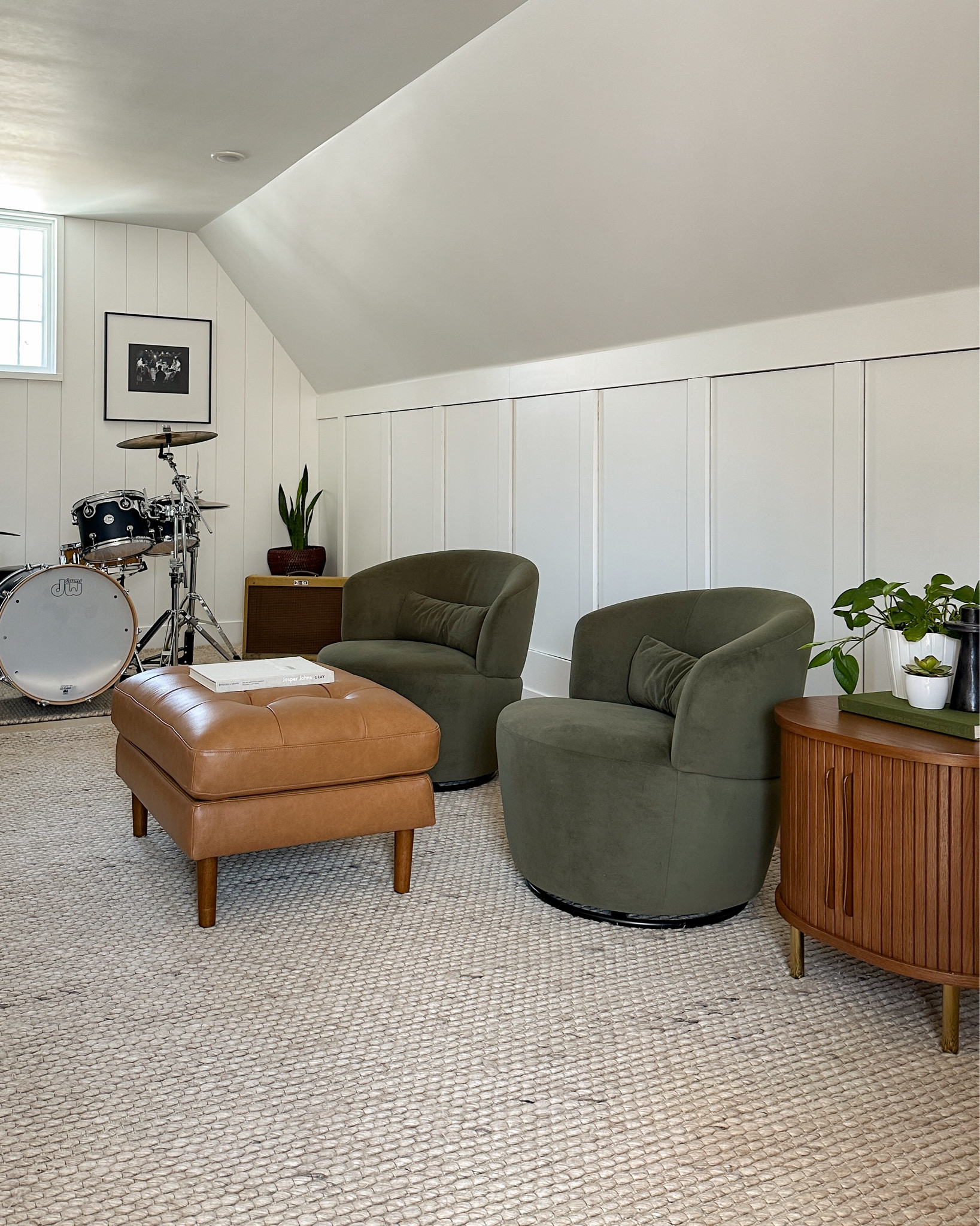 Band practice room makeover for Brian was so special 🫶. LOVE the swivel chairs. Nice quality and design + a really great value with amazing reviews! It comes in 3 colors but I picked the dark moss color for a richer tone to add contrast. The leather ottoman was a must have for Brian to kick up his feet. The work space has a nice sophisticated feel with the dark wood desk paired with the leather chair and green marble table lamp. Castlery has really high end looks but at a great value + they’re having a spring sitewide sale! Linking everything you see here. 

#LTKstyletip #LTKhome #LTKsalealert