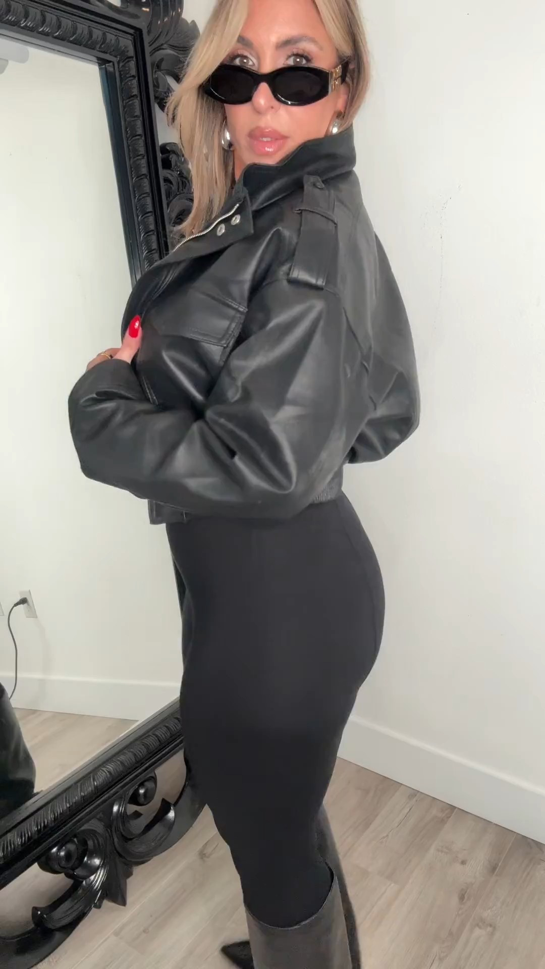 here is a modern alternative to the leather legging denim outfit combo. The jacket is a boxy cinch waist funnel style, all black gives elevated and chic. We swapped the heels for a boot for balance. I linked up a also linked top that would match the pants better. 

Black Jacket L
Burgundy Jacket XL
Leggings L
Long Sleeve XL
boots old length similar wide cap options
sunglasses miu miu also link the Amazon affordable version

#LTKMidsize #LTKFindsUnder50 #LTKOver40