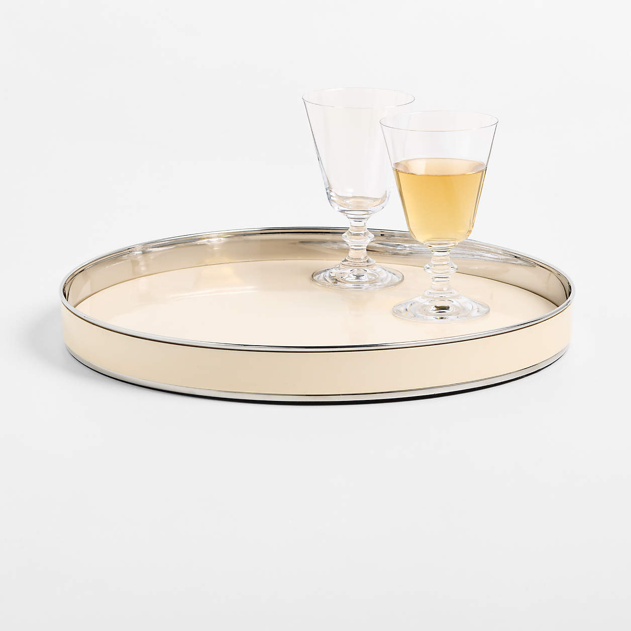 Romeo 15" Round Tray by Laura Harrier & Tiffany Howell | Crate & Barrel | Crate & Barrel