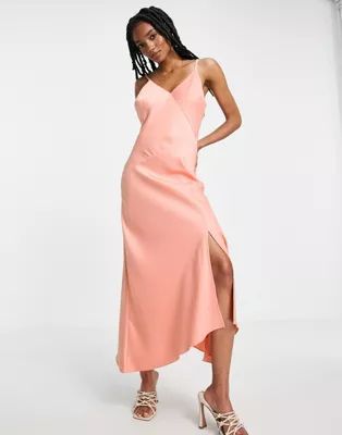 River Island asymmetric satin midi slip dress in pink | ASOS (Global)