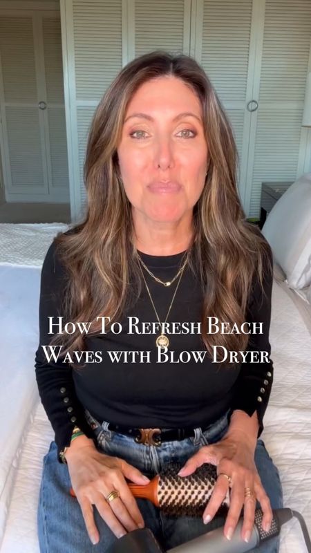 My Trick to Retouch Beach Waves with a Hair Dryer and Brush! 😊

✨Here’s a trick I learned way back when I was living as an editor in NYC and had to quickly refresh my “hairdo.” You will need a good hair dryer, round brush and some lightweight hair or texturizing spray. 
1. Use small sections of your hair and wrap around the brush.
2. Keep twirling outward 
3. Point the dryer over the twirled hair until warm to set and keep the shape.
4. Keep twisting out as you pull the brush out and go in for the next section. Do not touch until finished.
5. Let it set in place.
6. Run fingers through hair—do not brush. You can crunch it too for added body. 
7. Spray with hairspray or texturizing spray to hold and add some volume.

✨Now you have added some new life to your existing blow dry. Try this method and lmk how you like the results! 🥰

#hairtutorial #beautyover40 #beautytips #haircare

#LTKover40 #LTKstyletip #LTKVideo