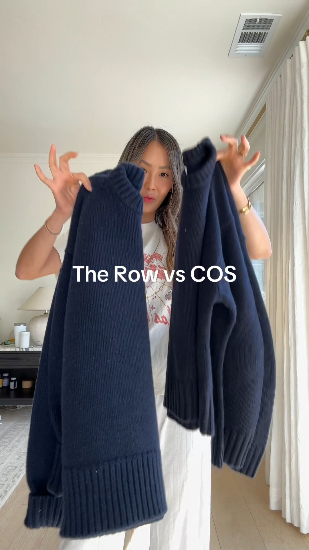 wearing both sweaters in size xs