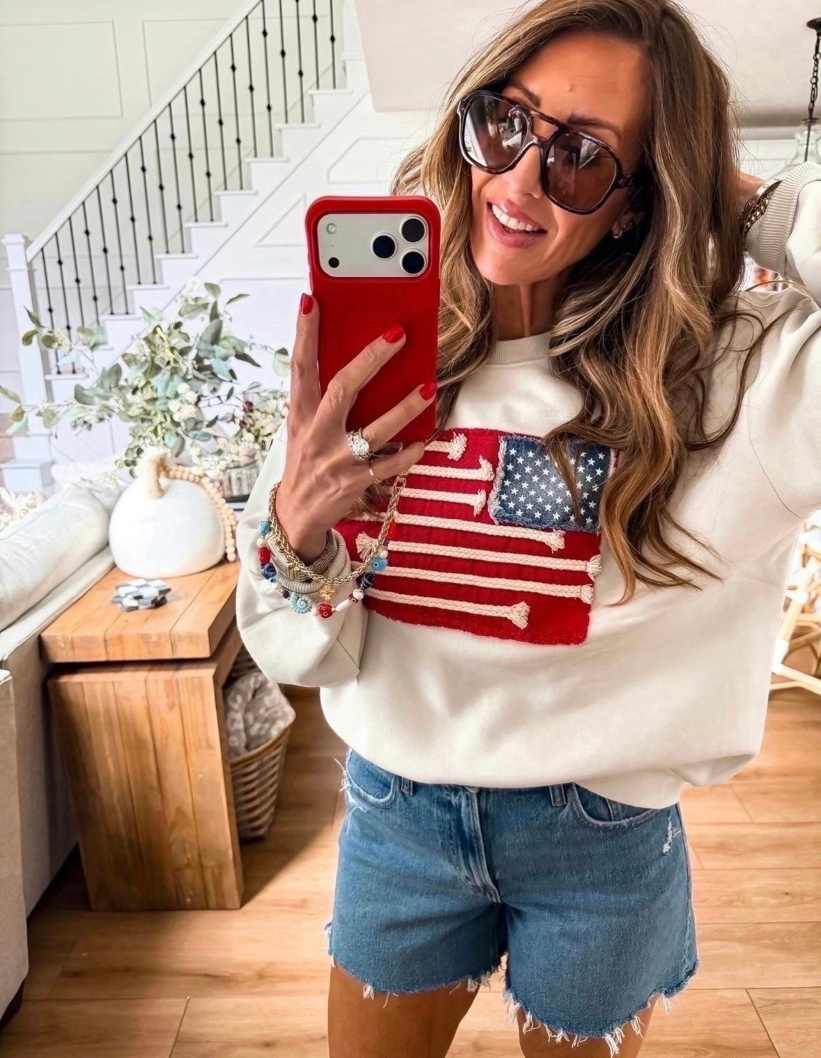 This patriotic sweatshirt is such a fun find for summer. I love the vintage inspired American flag detail paired with denim shorts for an easy holiday weekend look. Perfect for cool summer nights, lake trips, fireworks, and all your Fourth of July plans.

patriotic sweatshirt, fourth of july outfit, american flag sweatshirt, summer style, holiday weekend outfit, denim shorts outfit, lake day outfit, casual summer fashion, red white and blue style, vacation outfit, patriotic fashion, amazon fashion find, summer essentials, themominstyle

#LTKTravel #LTKSeasonal #LTKootd