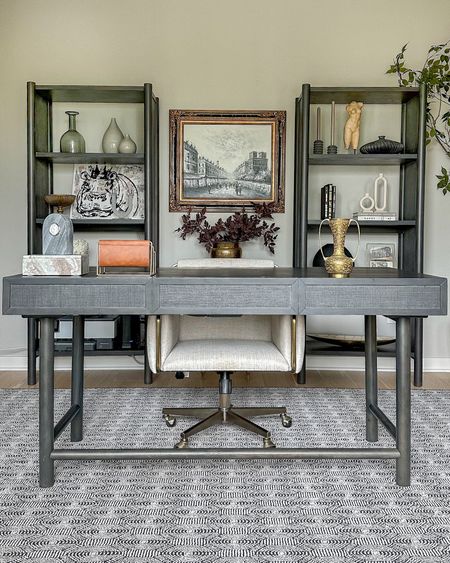 These bookcases in our office are on an amazing sale right now! I love the grass cloth detail on the sides! And this is the 60” desk paired with it that is a great priced and it’s powered! 

Artwork is vintage! Rug is custom but linked similar!

#LTKStyleTip #LTKHome #LTKSaleAlert