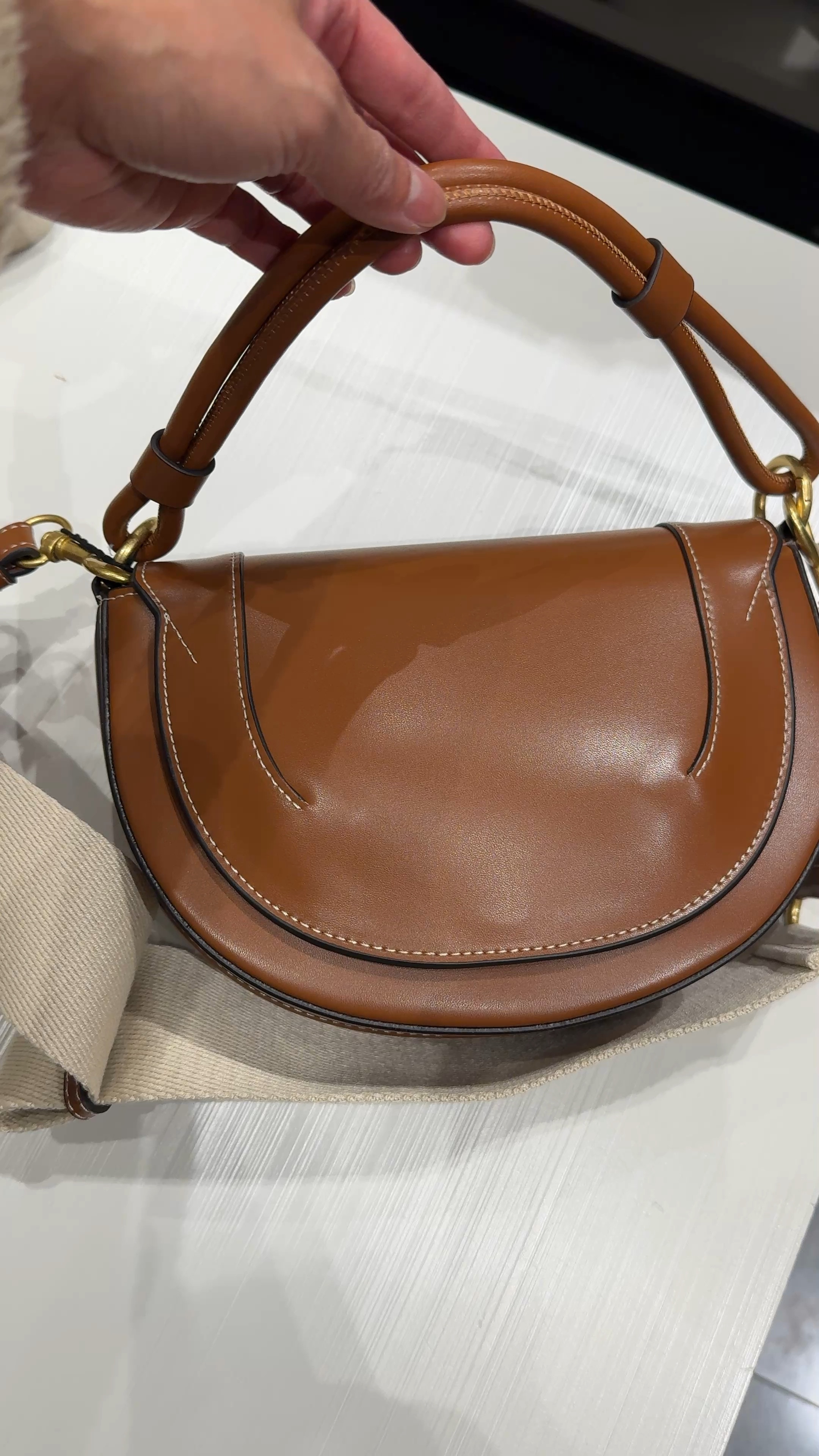 Crossbody bags under $50. 
All come with 2 straps for crossbody and shoulder carry. 
Beautiful cognac brown faux leather. 
Chic styles with designer vibes that go with everything. 


#LTKOver40 #LTKFindsUnder50 #LTKItBag