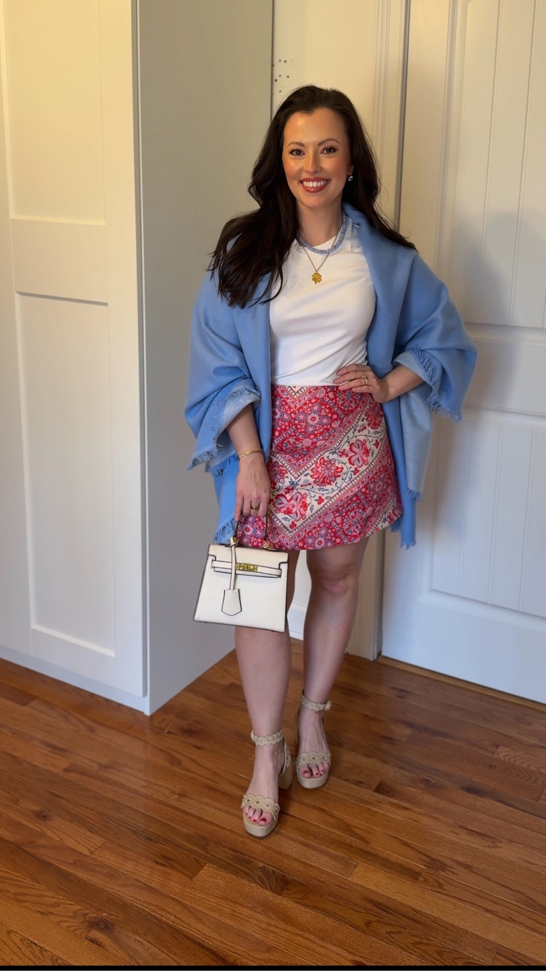 Skirt - I’m wearing Medium (4/6)
Veronica Beard Denim jacket - Small
White tee from Target - small
Larroude raffia block heel
Ivory small handbag for spring 
Ralph Lauren cricket sweater - small 
Alice walk hydrangea cashmere wrap 
How to style a mini skirt
One skirt styled 4 ways
Tuckernuck skirt 
Spring outfits 2026 
Vacation outfits beach 
Date night outfits
Spring date night outfit  

#LTKSeasonal #LTKTravel