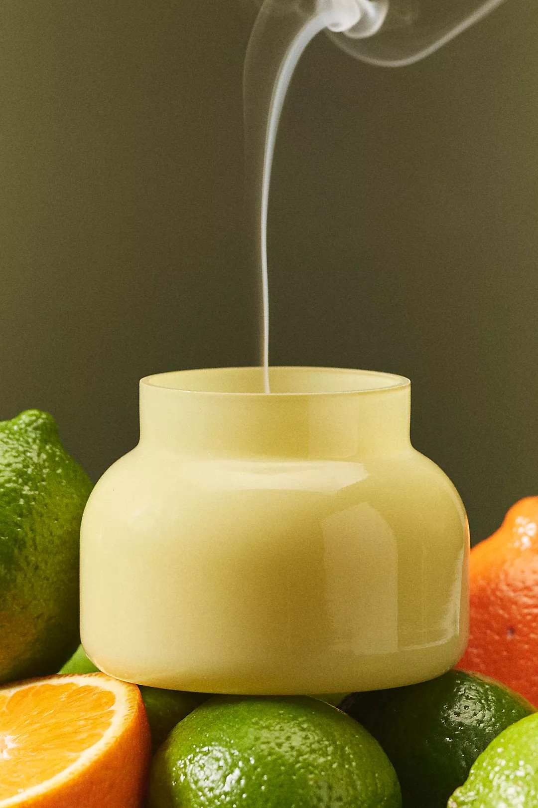 Capri Blue Volcano Spring Yellow Glass Jar Candle | Anthropologie (US)