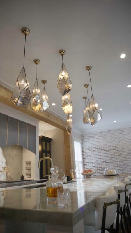 Run! Don’t walk. These lights are 30% off! Do you like the way we clustered them over our kitchen island? I wanted it to look more like an art installation instead of just light fixtures.

🏷️Home Decor, Kitchen Island, Home Renovation, Light Fixture 

#LTKstyletip #LTKVideo #LTKhome