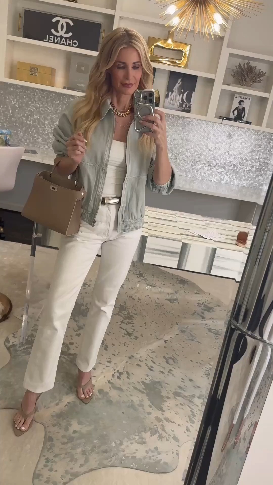 If you’re having one of those “nothing to wear” days, start with this easy formula: a white tank + white jeans + a great jacket. I paired my Agolde white jeans (size 24, TTS) with this Free People light-wash denim bomber, and it gives the outfit such an effortless, casual vibe. It’s the kind of look you can throw on and instantly feel put-together without even trying. The jacket runs true to size — I’m wearing an XS. Such a perfect go-to spring and summer outfit.  

 

#LTKootd #LTKSeasonal #LTKOver40