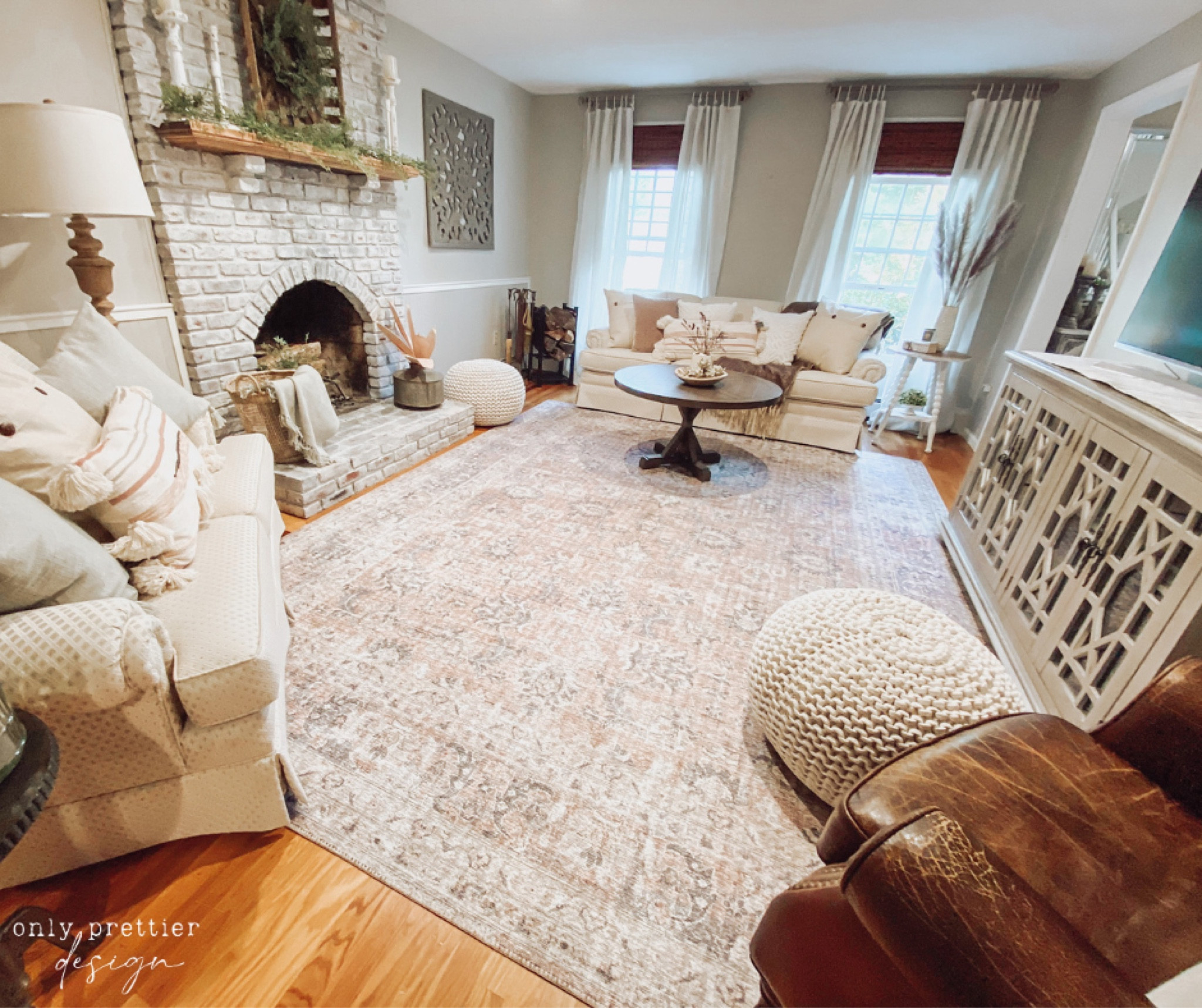 This living room is too beautiful! 🤩 The neutral furniture and fireplace decor make it the perfect space to relax with your family. 🌿

#LTKhome