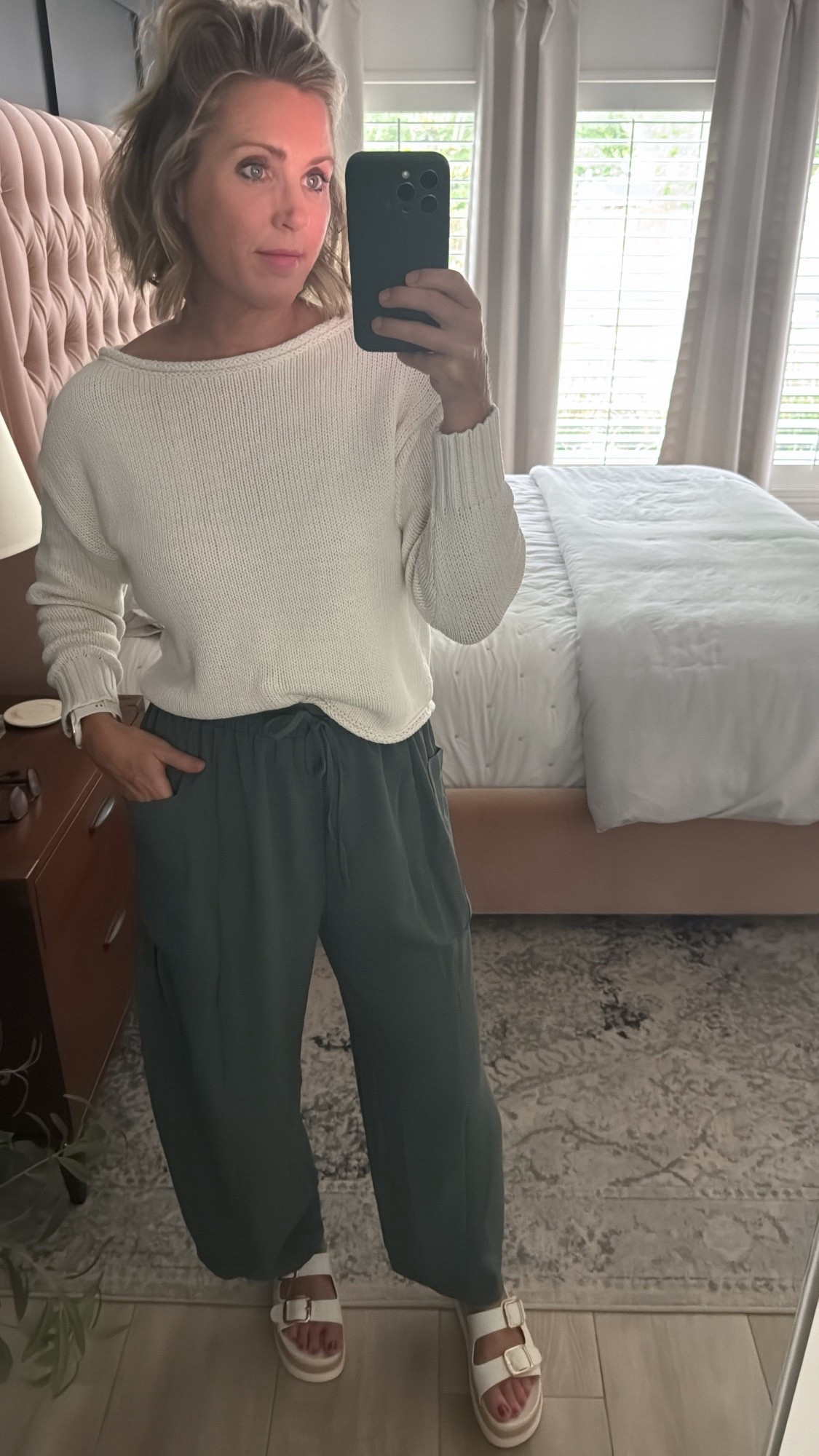 Wearing a small in the sweater and a medium in the pants  