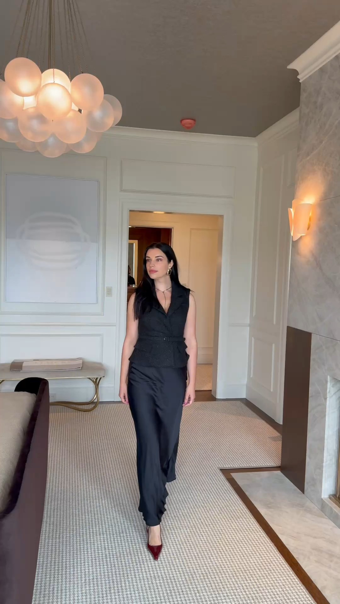 Channeling quiet luxury in San Francisco’s most breathtaking setting.
A tailored black vest + a silk slip skirt = effortless sophistication that moves with you.
Perfect for a day at the Decorator Showcase or a chic dinner in the city.”

Outfit Details:
	•	Vest: Classic tailored black tweed vest
	•	Skirt: Satin slip skirt with soft mermaid hem 
	•	Shoes: Burgundy pointed-toe heels for a subtle pop of color 
	•	Earrings: Gold statement hoops 
	•	Necklace: Minimal black cord lariat necklace 

#LTKstyletip: Pair structure (vest) with fluidity (silk skirt) for a modern, elevated silhouette. Add deep-toned heels to keep the look polished but unexpected.

#LTKfashion #LTKchic #QuietLuxury #SanFranciscoStyle #ShowcaseLook #LTKspring #ElegantStyle #CapsuleWardrobeEssentials