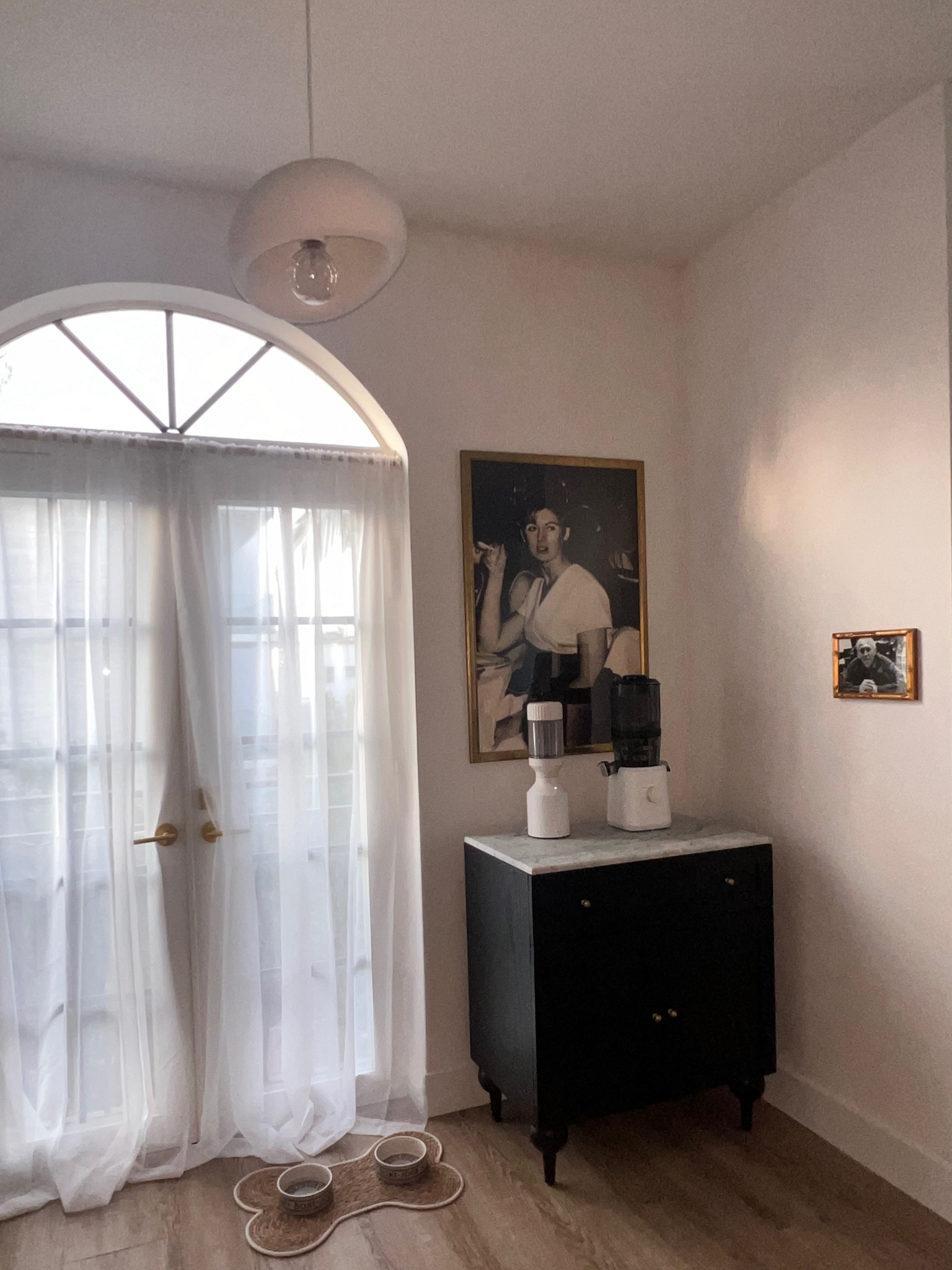 Cutest little coffee juice bar nook in my kitchen. The large black and white photo is of my late grandmother and the small black and white photo is my late grandfather. I love making my morning smoothies with them! 

#interiordesign
#home 

#LTKFindsUnder100 #LTKStyleTip #LTKHome