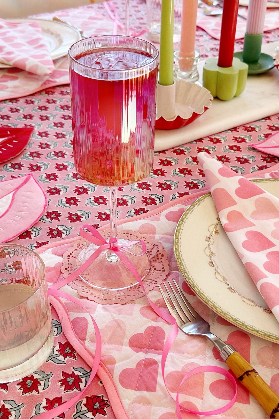 Getting my galentine’s table set with this stunning @joyjolt Christian Siriano New York chroma iridescent fluted glassware set. The way the light reflects off the iridescent ribbed design gives my table some major wow factor! I used a few other fun Valentine’s Day styling hacks for the cocktails, including adorning the bases with long bows of thin satin ribbon, and filling them up with heart shaped ice cubes that I flavored and tinted with cranberries – YUM! Tagging these @joyjolt glasses, along with pieces from the chroma fluted glassware collection my @shop.ltk page today – go check the rest of them (the coupes are even more fabulous, and make a really fun way to serve a Valentine’s dessert!) #ad #DomestikateHappyHour #joyjoltmoments #withjoy #joyjolt #AJoyJoltValentines 

#LTKhome #LTKSeasonal
