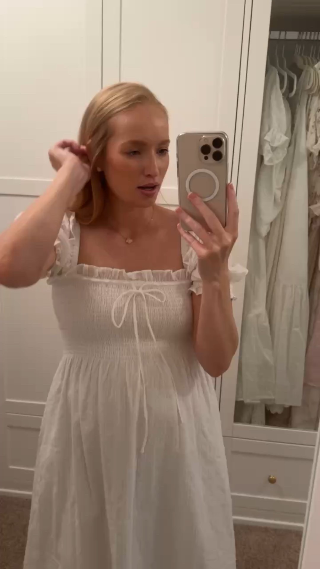 How I hang my dresses that have smocking along the straps to keep the smocking from getting stretched out! Fashion hack // spring dresses // white dresses // Hill House dresses // shower dresses // brunch dresses // bridal dresses // bump friendly dresses 

#LTKStyleTip #LTKBump #LTKSeasonal