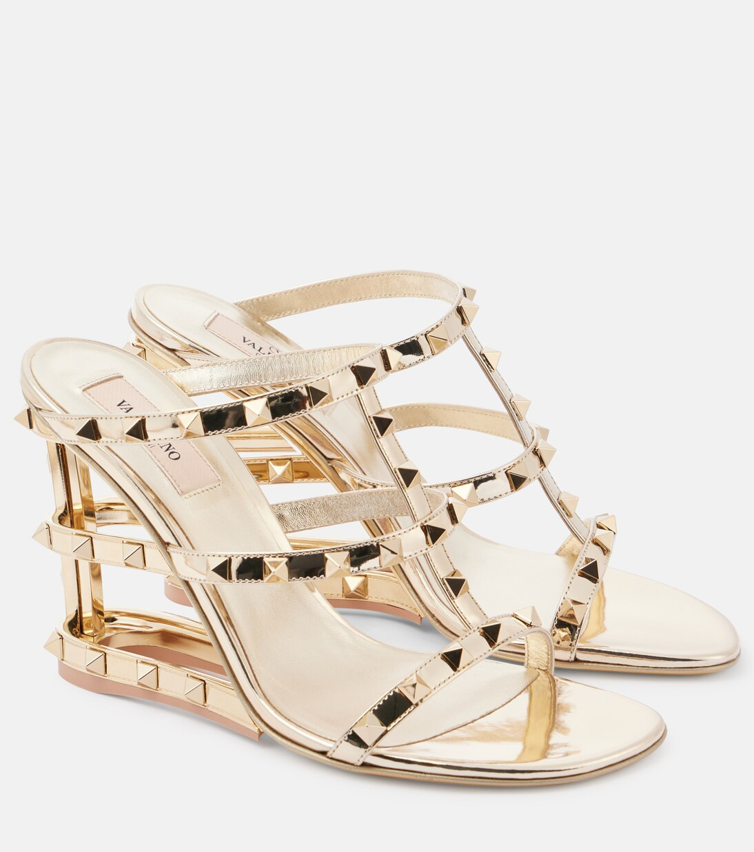 Rockstud 100 mirrored leather wedge sandals | Mytheresa (US/CA)