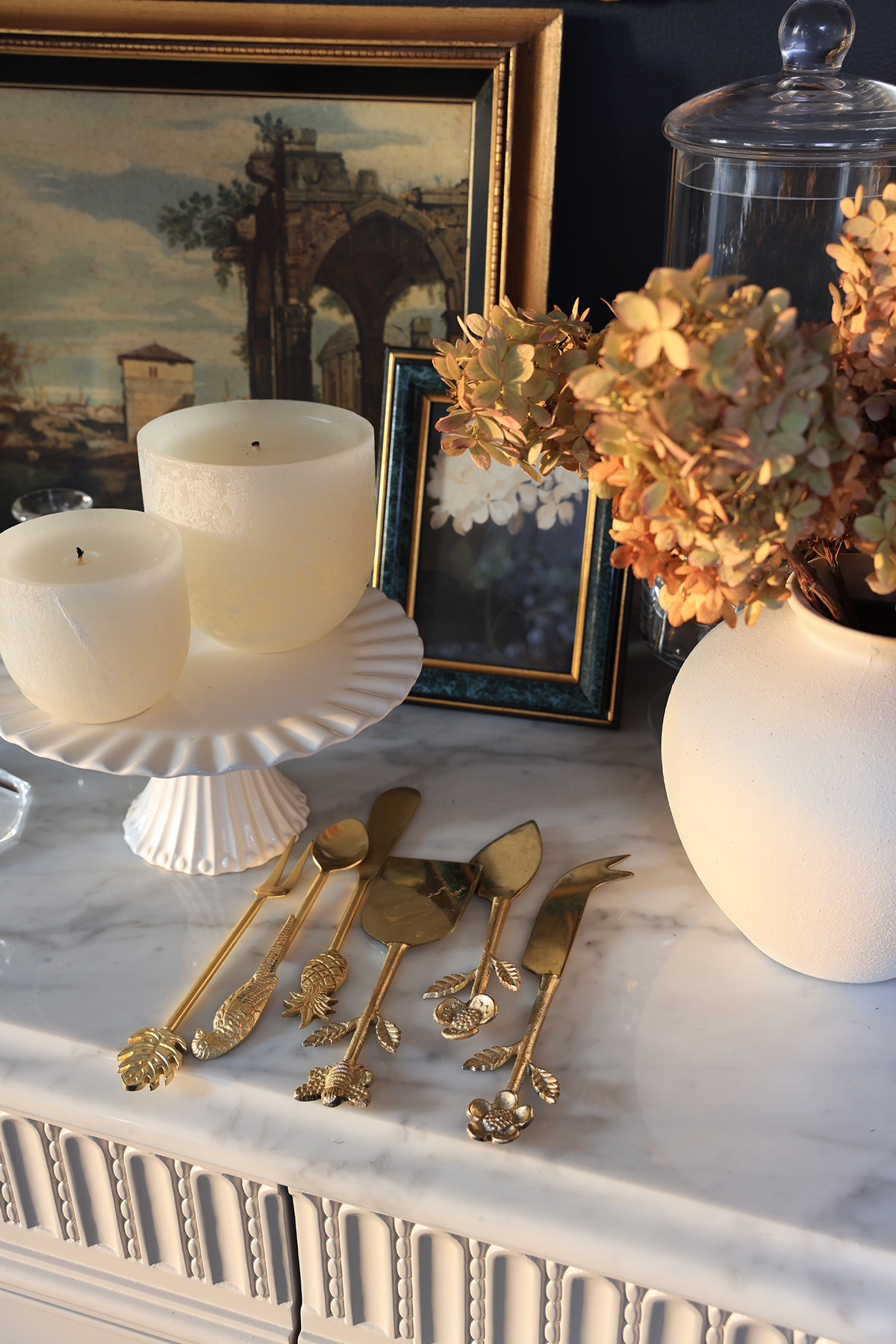 Pretty serving utensils with nature motifs | Entertain in style with beautiful brass serving sets! Stirring spoons, cake serving set, and charcuterie utensils. Leaf motifs, floral handle serverware, and other nature themes.   

 #LTKHome