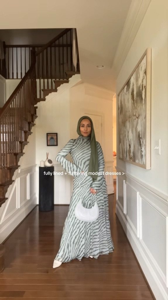 so flattering! think of this dress styled with a trench over it or a cape with brown suede boots 