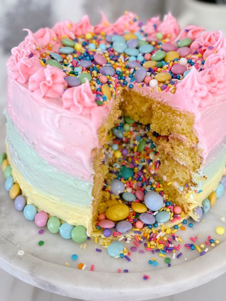 I just made the cutest cake…the Surprise-Inside Easter Candy Layer Cake! I got the recipe from the Betty Crocker website.  This recipe looks intimidating, but it was actually pretty easy!  #Target #TargetPartner #BettyCrocker @bettycrocker @target 


#LTKhome #LTKSeasonal #LTKparties