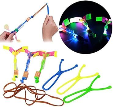 10 PCS Amazing Led Light Arrow Flying Toy Party Fun Gift Elastic, Flying Arrow Outdoor Flashing C... | Amazon (US)