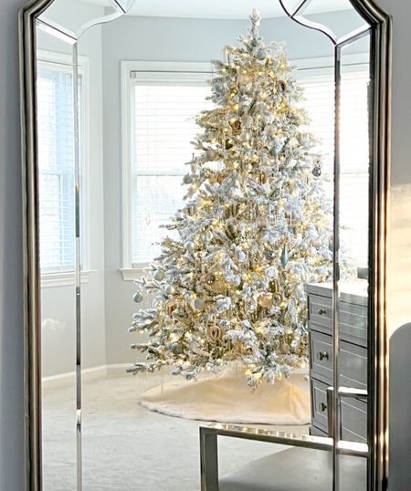 My flocked King of Christmas Tree is currently on sale for more than half off for Black Friday  7.5’ winter wonderland, grandmillennial neutral, metallic Christmas tree with silver and gold  

#LTKCyberWeek #LTKhome #LTKSeasonal