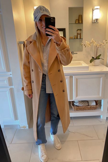 trench coat. winter trench. stripe shirt. stripe button down. button down shirt. mom jeans. baggy jeans. mom style. mom ootd. ootd. white sneakers. Golden Goose. Saint Laurent sneakers  

#LTKworkwear #LTKshoecrush