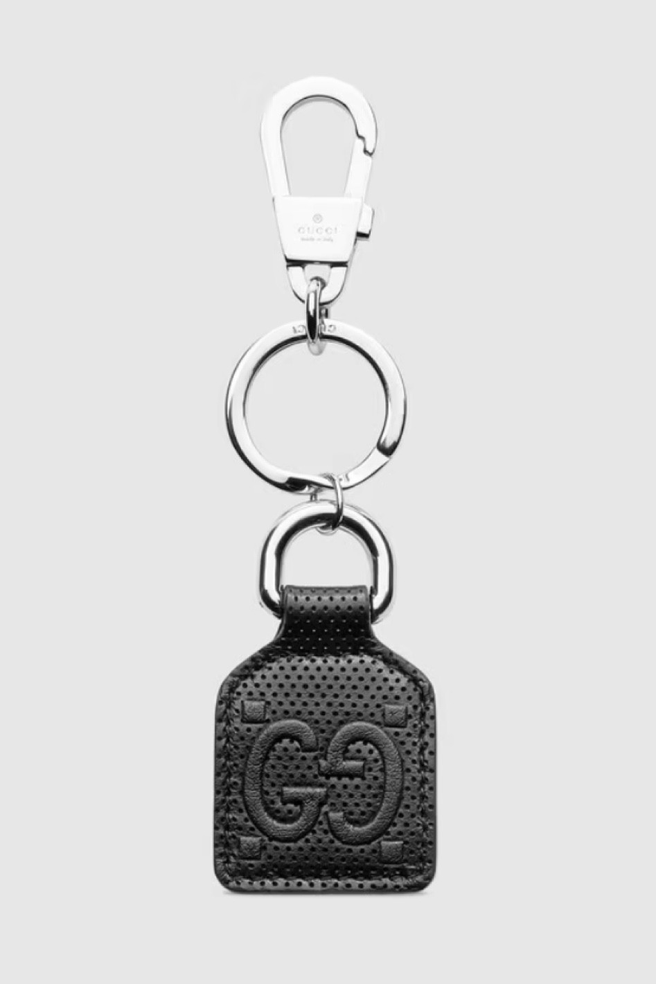 Gucci black leather GG key fob
A new interpretation of the GG motif presented within the Pre-Fall 2020 collection plays with texture, embossing the House emblem onto a black perforated leather base. The lather tab detail presents the House emblem, attached to a silver-toned metal key ring with additional hook.

Black GG embossed leather
Silver-toned hardware
Key ring and hook fastening
W4cm x H15cm
Made in Italy


#LTKGiftGuide #LTKmens #LTKstyletip